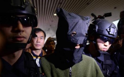 21年后嫌疑人投案自首 中国最大武装劫钞案